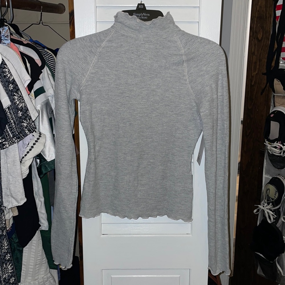 Gray knit turtle neck.